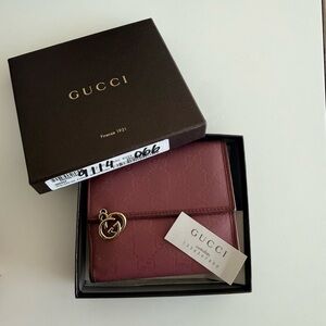 Gucci Women's pink Leather Wallet with Interlocking G Charm